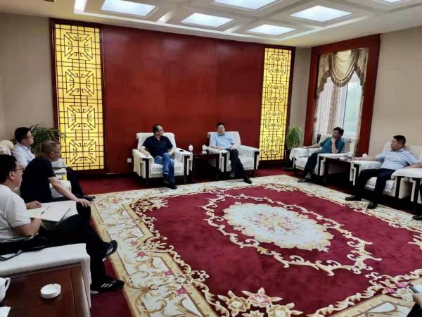 vsport体育携中化矿山总局与准格尔旗人民政府开展合作交流洽谈