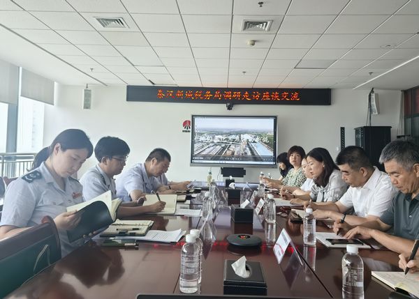 秦汉新城税务局党委委员、副局长刘明俊一行到陕煤建设天工公司走访座谈